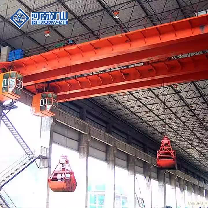 Dual-purpose EOT crane with hook and grab bucket for industrial lifting